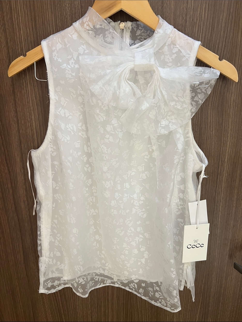 CeCe Sheer White Sleeveless Bow-Neck Floral Tunic